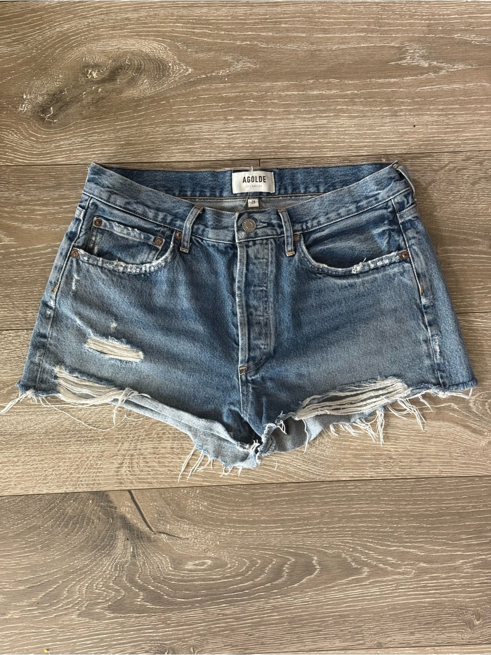 Agolde Parker Distressed Cutoff Denim Shorts in Medium Blue Wash